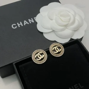 Chanel 24K round ear studs