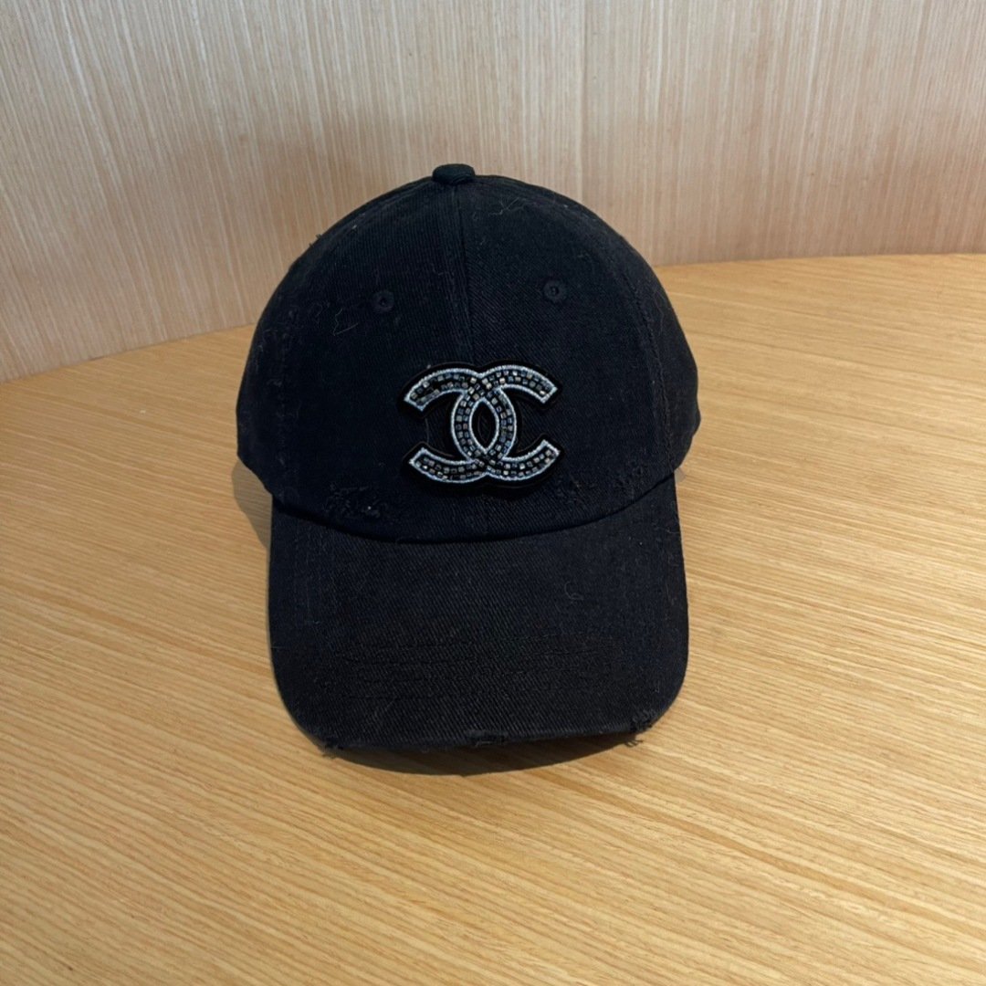 CHANEL Distressed Black Cotton Cap with Crystal CC Emblem
