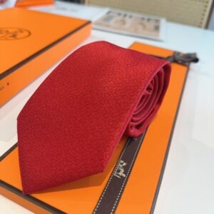 Hermès Burgundy Twill Silk Tie with Subtle Geometric Pattern
