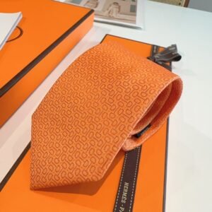 Hermès Orange Silk Tie with Geometric Jacquard Pattern