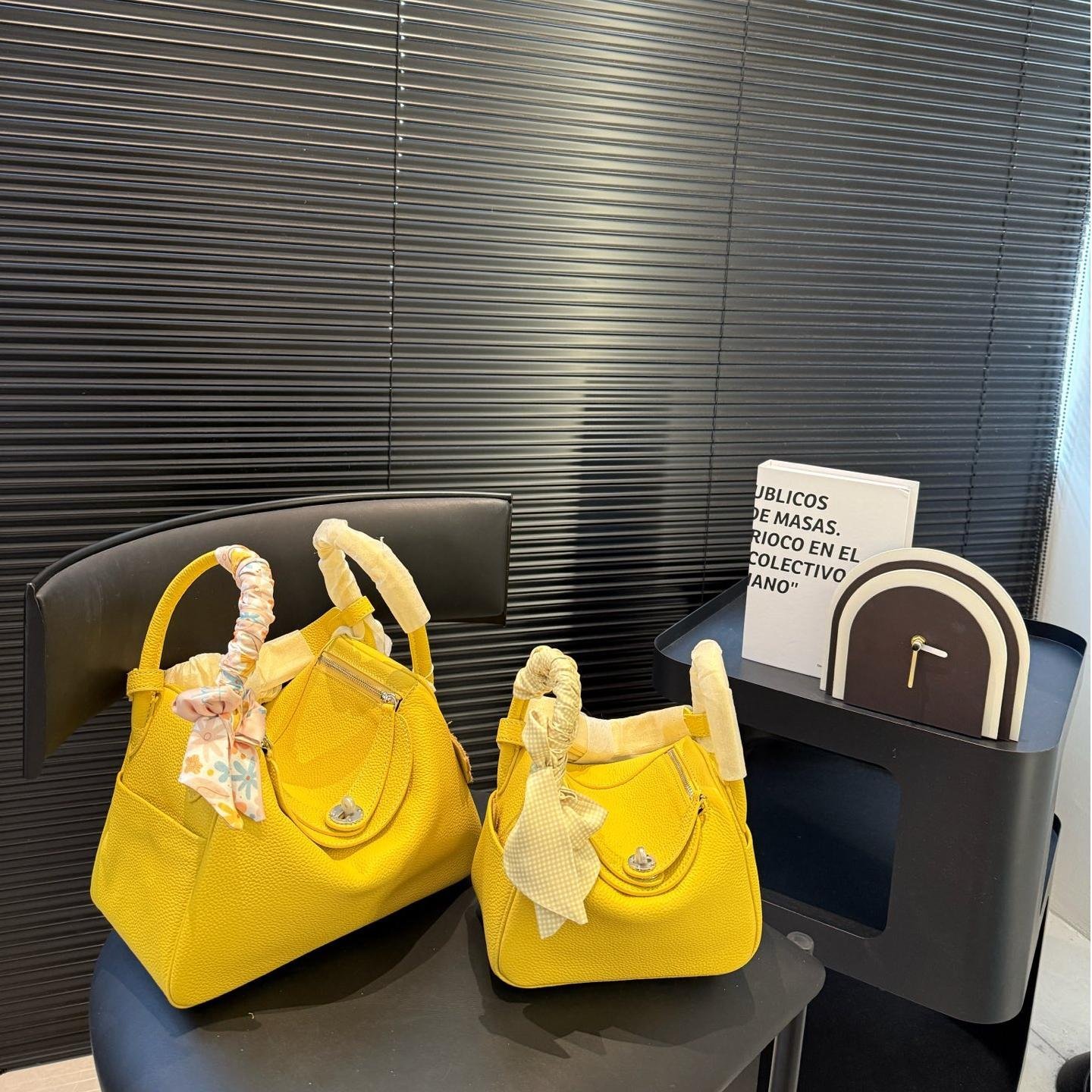 Lindy 19 & 26 in Lemon Yellow Clemence Leather – Youthful Utility with Parisian Ease