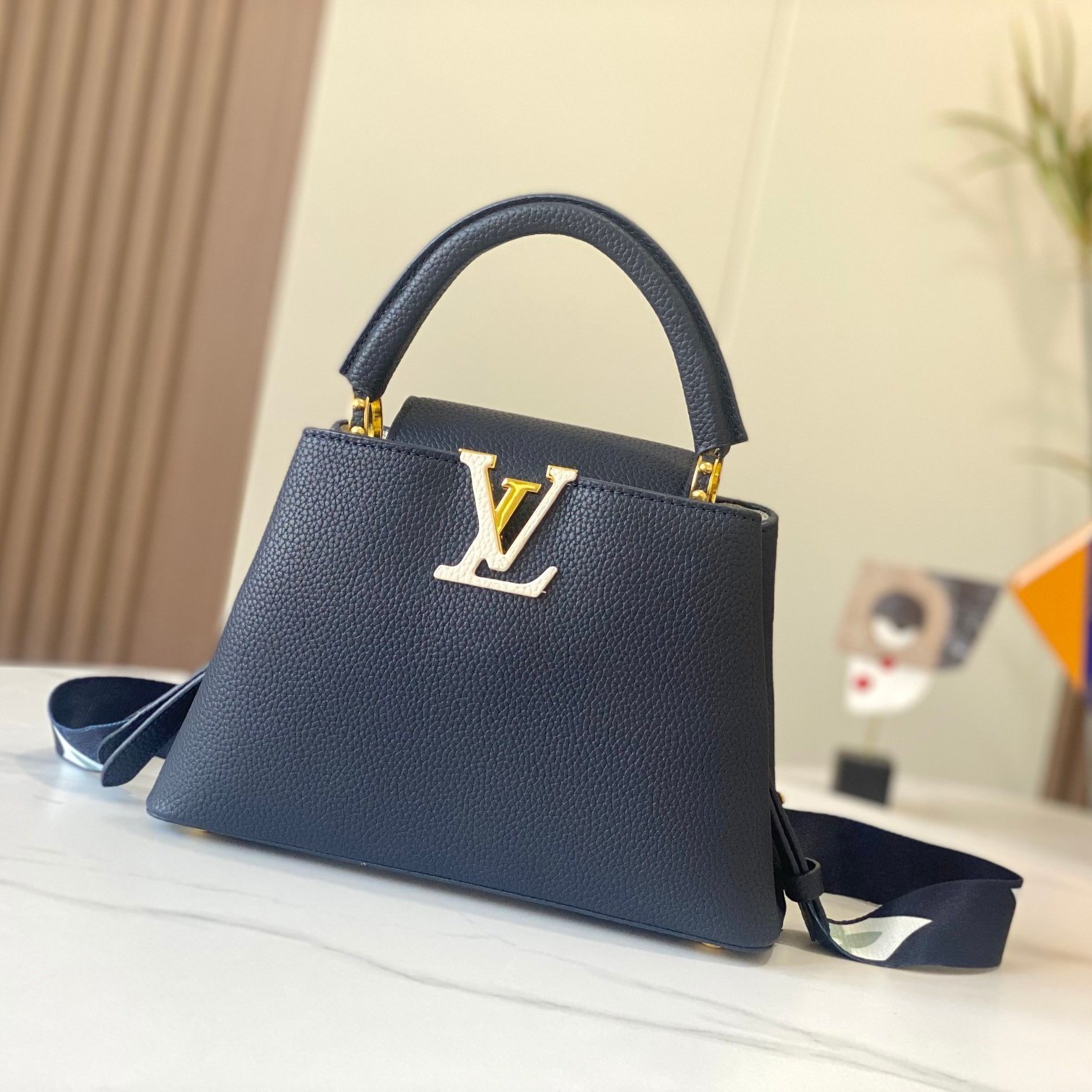 Capucines MINI Navy Blue Taurillon Leather 21CM