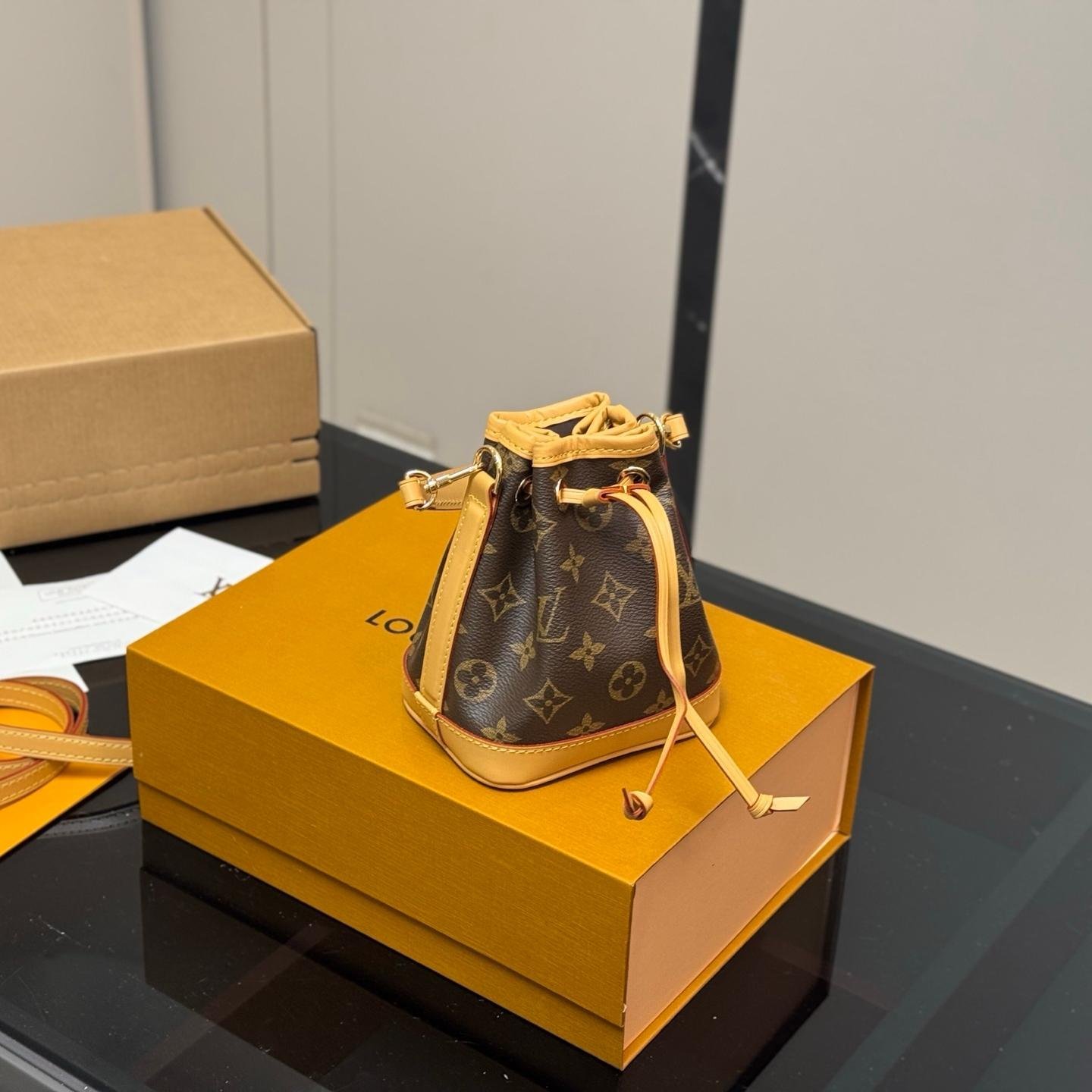 Nano Monogram Bucket Bag – Mini Crossbody 16cm